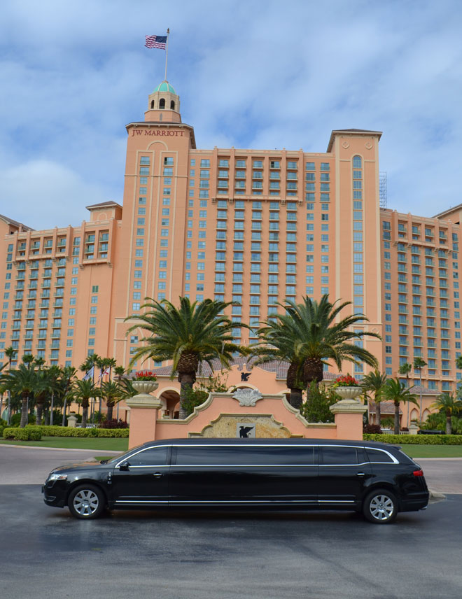 Elegant limousine with professional chauffeur in scenic South Florida